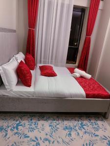 Postel nebo postele na pokoji v ubytování TrueComfort