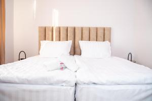 Postel nebo postele na pokoji v ubytování Орбелус