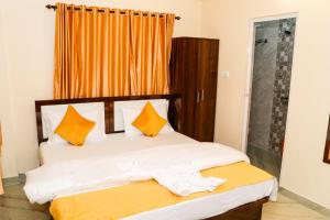 Postel nebo postele na pokoji v ubytování Sunflower Inn