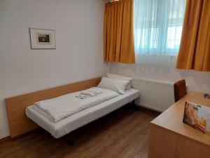Postel nebo postele na pokoji v ubytování Taste Style Hotel Bären Auggen