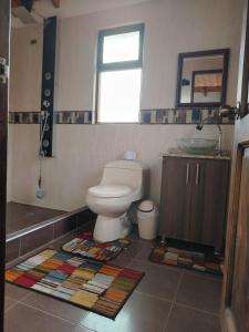 Ένα μπάνιο στο Cabaña Villa Mariana