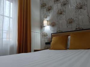 Postel nebo postele na pokoji v ubytování Le terme alloggio turistico