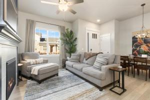 a living room with a couch and a fireplace at NOCO Retreat with King Beds, Fireplace, Scenic Trails in Loveland