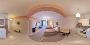 Postel nebo postele na pokoji v ubytování Hotel Vasilis Nafplio