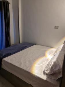Postel nebo postele na pokoji v ubytování Baba Dool