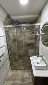 Łazienka w obiekcie Geregs alibi - free Spa