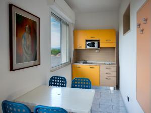 A kitchen or kitchenette at Hotel Sileoni Dépendance Villa Antonio