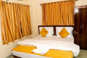 Postel nebo postele na pokoji v ubytování Sunflower Inn