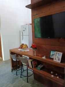 TV a/nebo společenská místnost v ubytování Maravilha Hospedagem Moreré