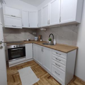 Cucina o angolo cottura di Apartman N&L