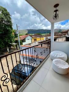 Balkoni atau teres di Casa Serra Vale - 2 suítes - Centro Histórico