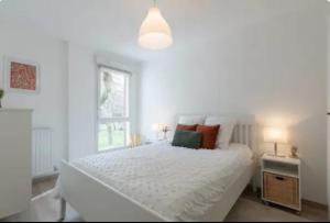 Voodi või voodid majutusasutuse Appartement cocon toas