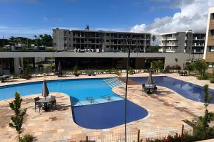 Bazén v ubytování Mana Beach na Praia de Muro Alto Porto de Galinhas a 300 metros da Praia nebo v jeho okolí