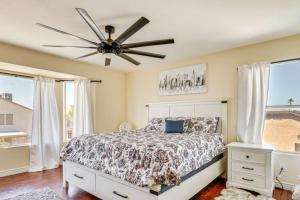 a bedroom with a bed and a ceiling fan at Valley View Retreat in Glendale