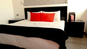 Postel nebo postele na pokoji v ubytování Hotel Black Boutique