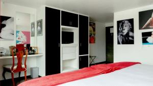 Postel nebo postele na pokoji v ubytování Hotel Black Boutique