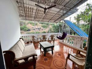 Balkoni atau teres di Palms Villa - First Floor