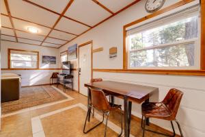 a dining room with a table and chairs at Grill and Beach Access Cabin in Tahoe Vista! in Tahoe Vista +16 photos