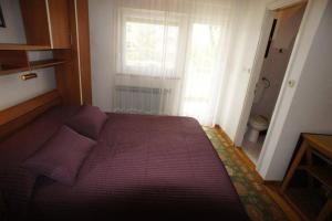 Postel nebo postele na pokoji v ubytování Guest House Marta