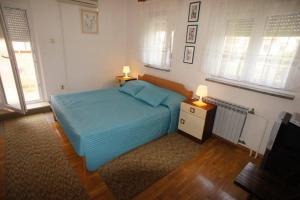 Postel nebo postele na pokoji v ubytování Guest House Marta