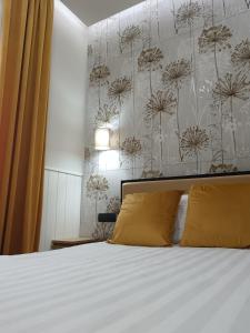 Postel nebo postele na pokoji v ubytování Le terme alloggio turistico