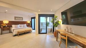 Cama ou camas em um quarto em Coconut's Maresias Hotel