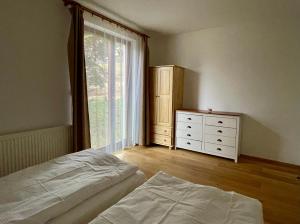 Postel nebo postele na pokoji v ubytování Chata Smrčka