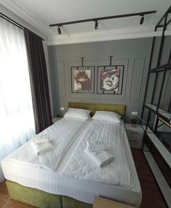 Ένα ή περισσότερα κρεβάτια σε δωμάτιο στο Apartman Milic