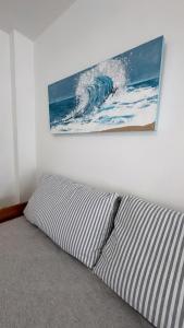 En eller flere senge i et værelse på Departamento Atlantic