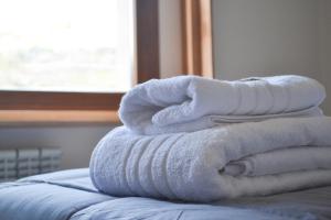 Ένα ή περισσότερα κρεβάτια σε δωμάτιο στο De los Tres