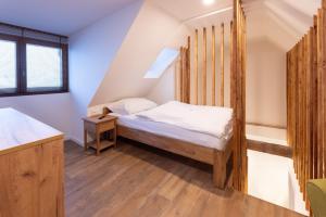 Letto o letti in una camera di Appartements Stuhleckblick