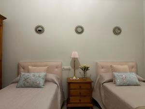 A bed or beds in a room at Like Home