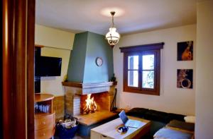 TV a/nebo společenská místnost v ubytování Italiano Bed & Breakfast