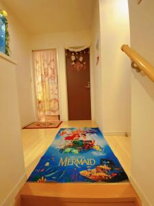 Postel nebo postele na pokoji v ubytování yiyi tokyo disney minpaku