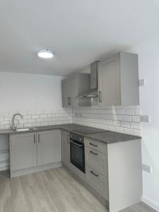 Η κουζίνα ή μικρή κουζίνα στο Sapphire Suite +3 φωτογραφίες