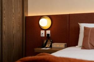 Postel nebo postele na pokoji v ubytování Maxim Hotel - Auckland