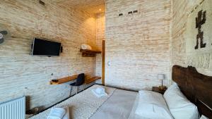 TV a/nebo společenská místnost v ubytování Hotel Arrebol + 23 fotografií