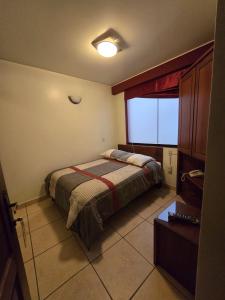 Postel nebo postele na pokoji v ubytování Amaru Peru Hotel