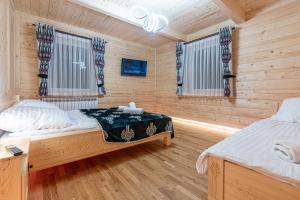 Ένα ή περισσότερα κρεβάτια σε δωμάτιο στο Villa Balos +220 φωτογραφίες