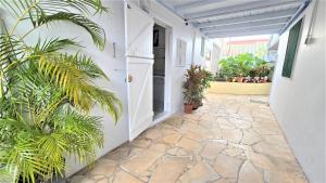 Fotografie z fotogalerie ubytování Suite familiale 4 personnes chez l'habitant - Sports & aéroport à proximité v destinaci Le Lamentin
