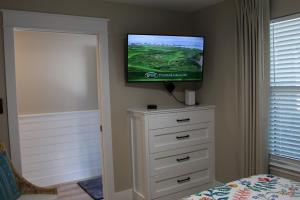 TV a/nebo společenská místnost v ubytování Summerspell Condominum