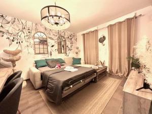 Posedenie v ubytovaní Le Plessis Capitale - Appartement entier avec jardin