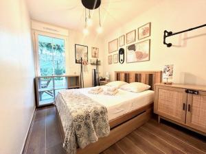 Posteľ alebo postele v izbe v ubytovaní Le Plessis Capitale - Appartement entier avec jardin