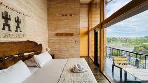 Postel nebo postele na pokoji v ubytování Hotel Arrebol