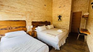 Postel nebo postele na pokoji v ubytování Hotel Arrebol