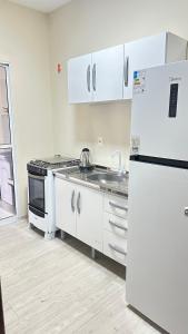 Η κουζίνα ή μικρή κουζίνα στο Casa Luz Dourada