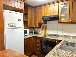 Kuchyň nebo kuchyňský kout v ubytování Apartament encantador, familiar i lluminós by RURAL D'ÀNEU