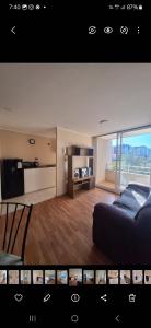 テムコにあるCondominio Alto Durand, con Estacionamiento, a 5 minutos del casino, Portal Temuco, supermercados, restaurantes y tiendas, cafeterías y clínica 2d 1bのリビングルーム(ベッド1台付)、キッチンが備わります。