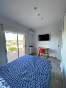 Postel nebo postele na pokoji v ubytování Departamento boutique del mar 2