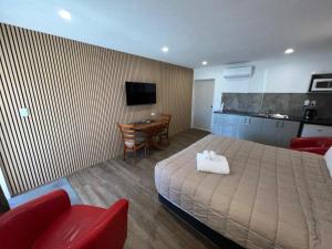 Kuchyň nebo kuchyňský kout v ubytování Academy Lodge Motel